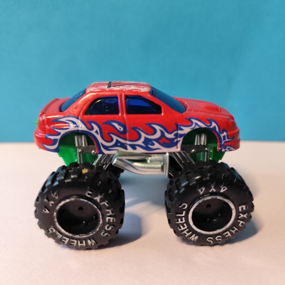 2/$12🍒Red Montater Truck With Blue And Yellow Flames - Picture 3 of 5